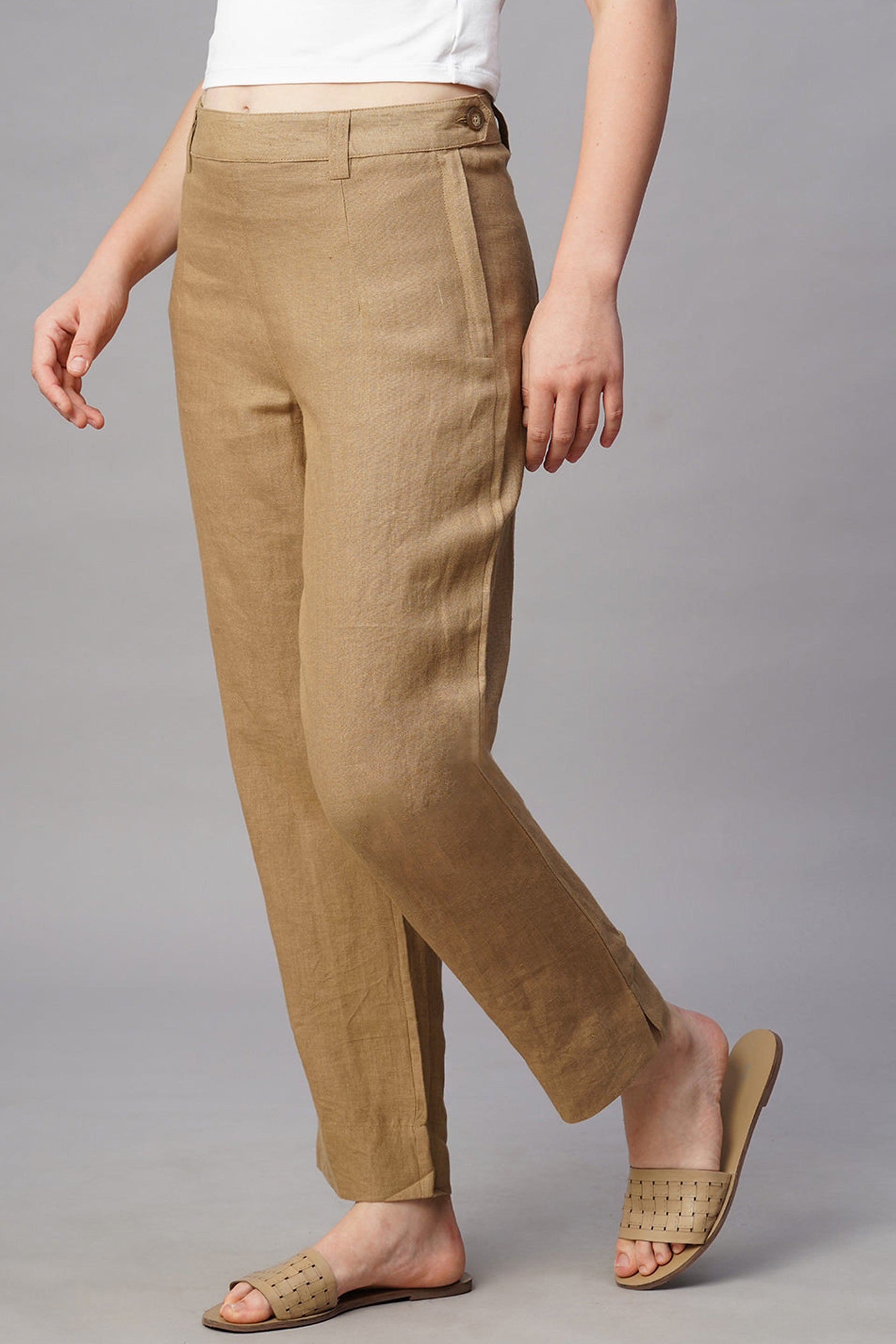 Stylish women's khaki linen pants with a tailored fit, perfect for casual or formal wear