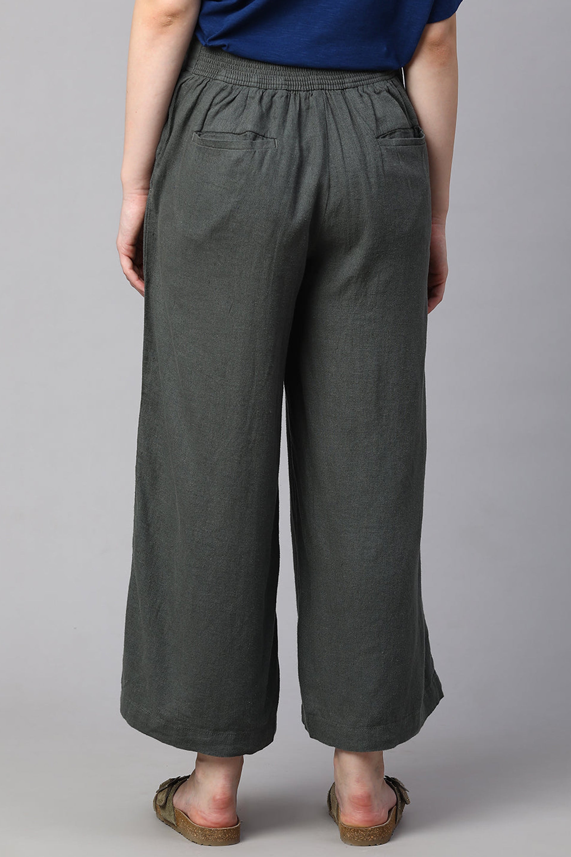 Women's linen culottes in dark green with relaxed fit and elastic waistband for comfort
