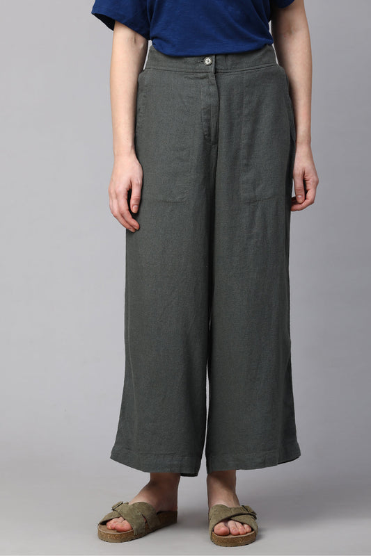 Comfortable dark green women's linen culottes with a relaxed fit and button closure