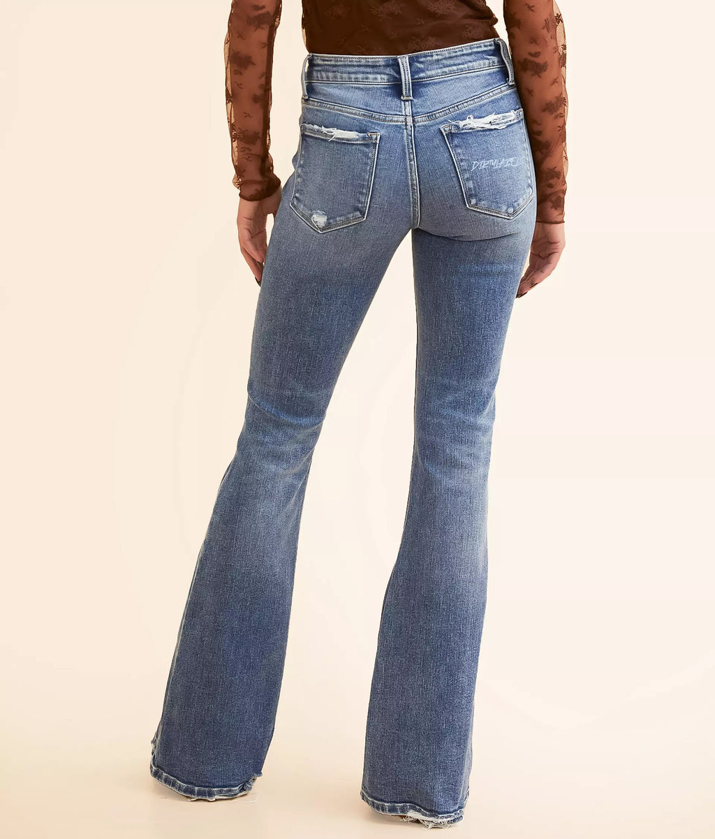 Back view of women's mid-rise flare jeans featuring a stylish distressed design and a fitted silhouette
