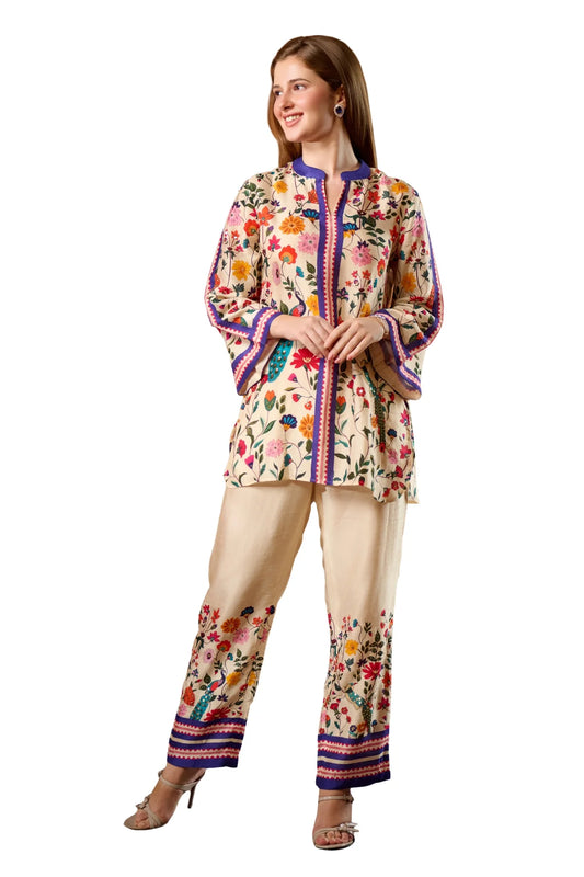 Elegant women's raw silk ethnic wear online with floral embroidery and unique color pattern