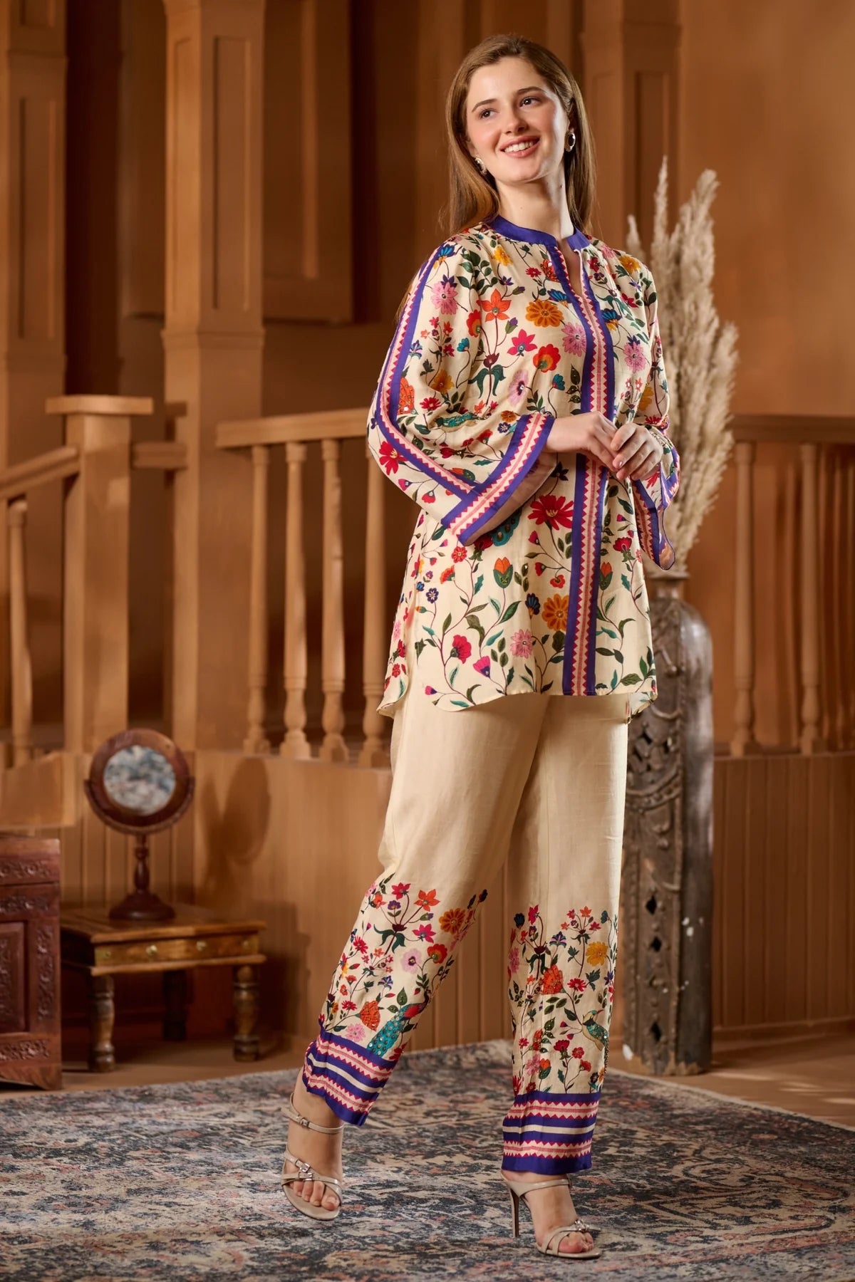 Elegant women's raw silk ethnic wear online featuring floral embroidery and coordinated pants