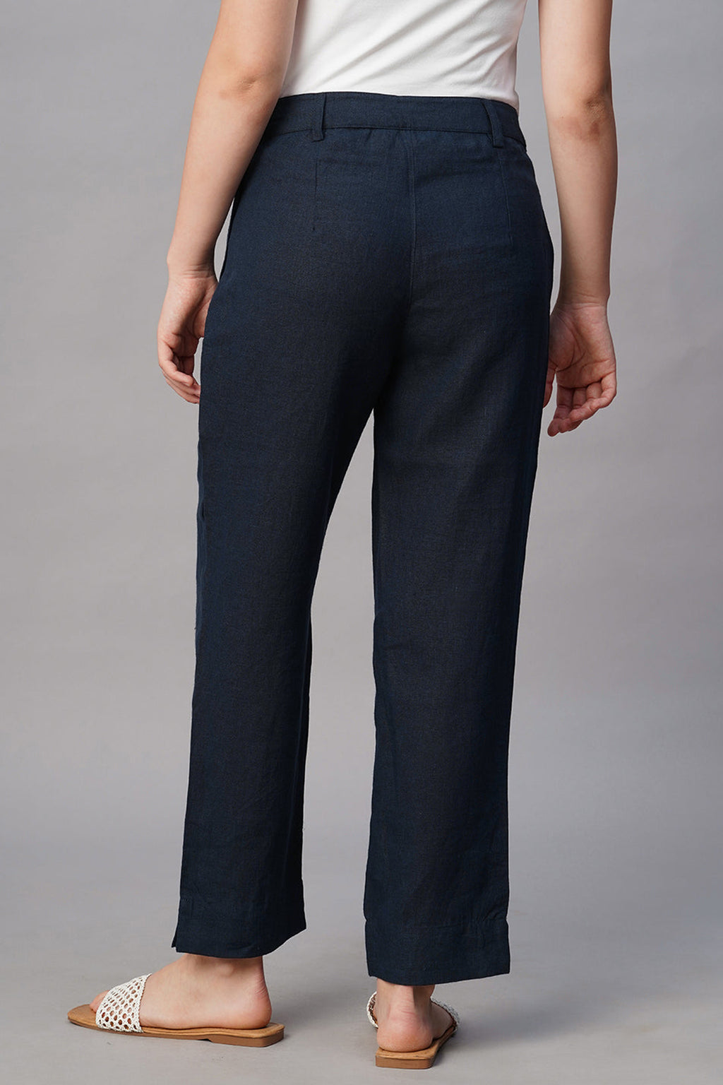 Back view of Women's Summer Linen Pants in dark blue, perfect for warm weather and casual outings.