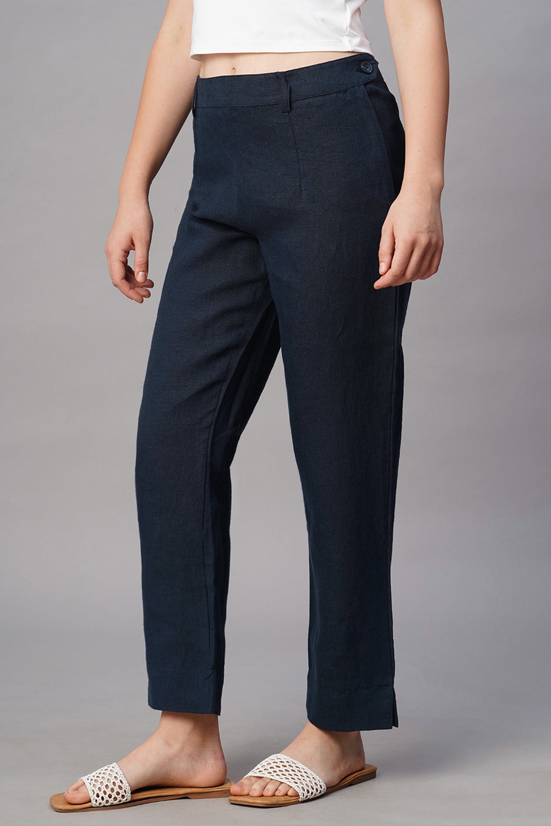 Elegant Women's Summer Linen Pants in navy blue with a relaxed fit and stylish hem detail